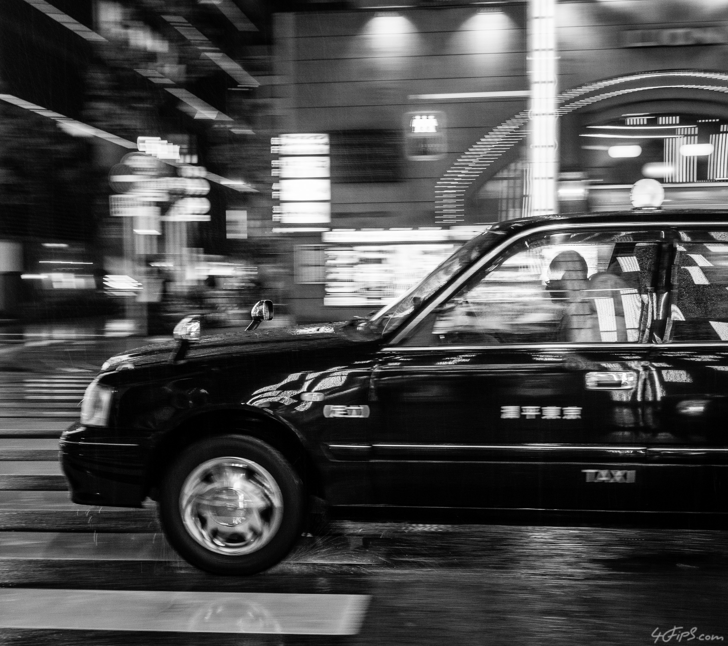 Another Sleek Taxi Speeding up at Ginza