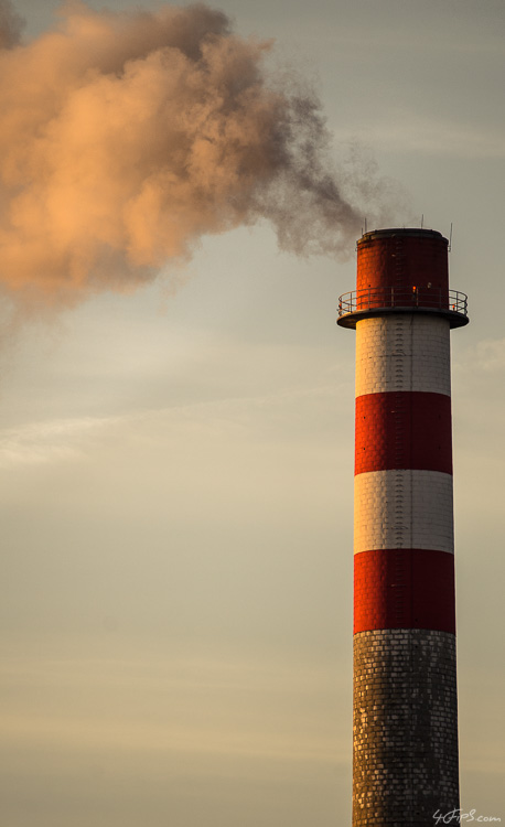 A Factory Chimney at Sunset
